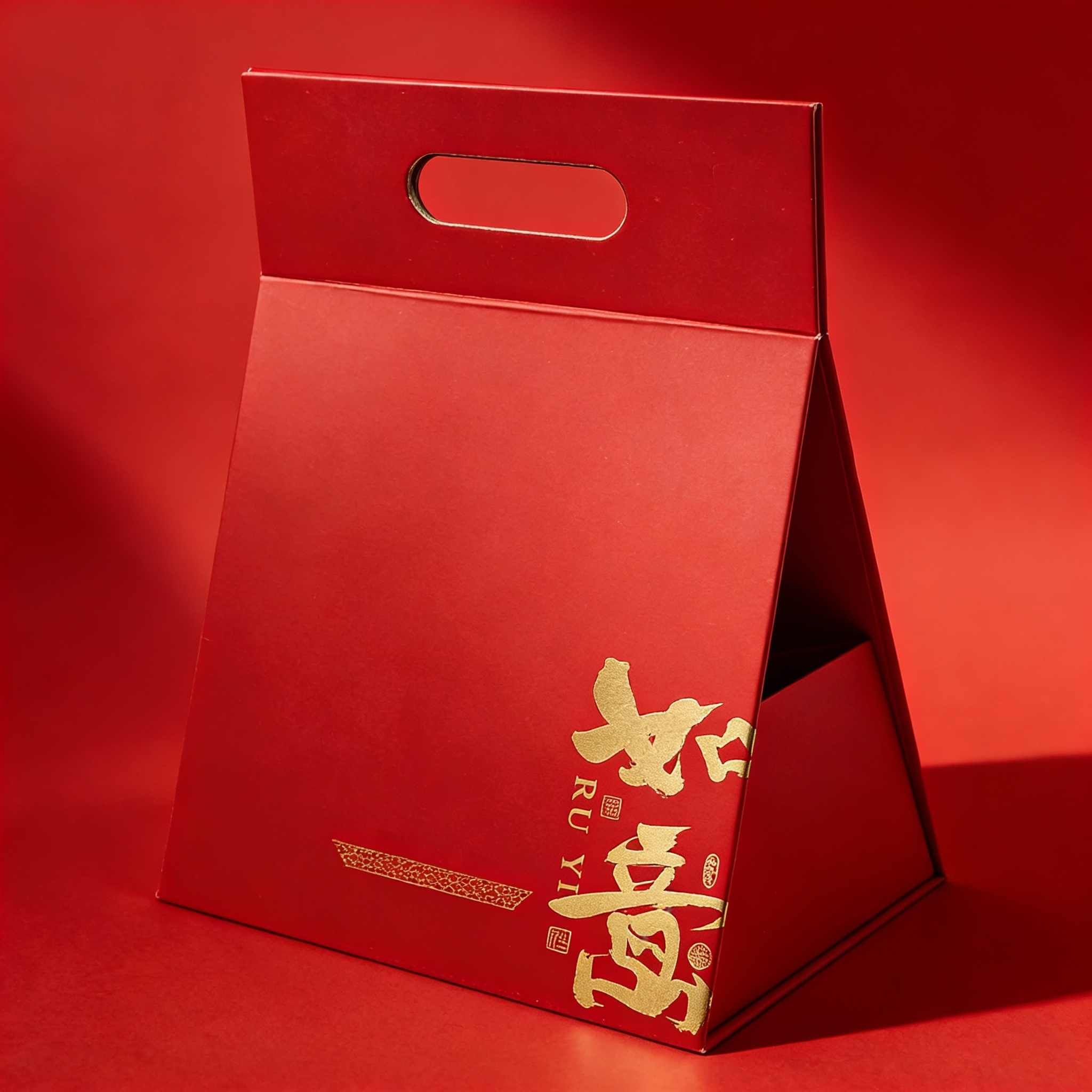Folding triangular handheld box